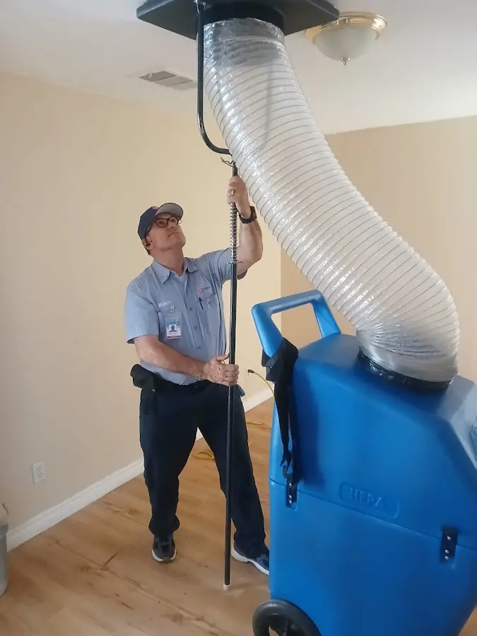 Furnace Tune-Up technician using HEPA equipment in Moorpark